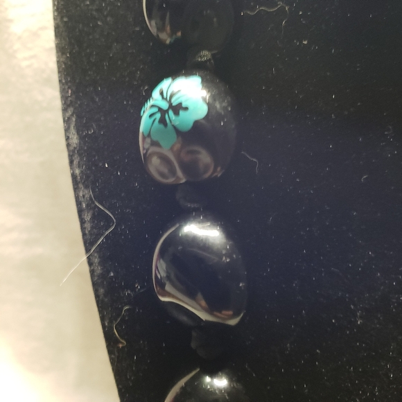 Beautiful Black Chunky Hawaiian Kukui Nut Lei Necklace with Ribbon Closure - Picture 3 of 8